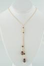 The Gold Bolo in Black Pearls and Garnet