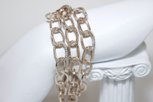 Triple Strand of Lined Ovals